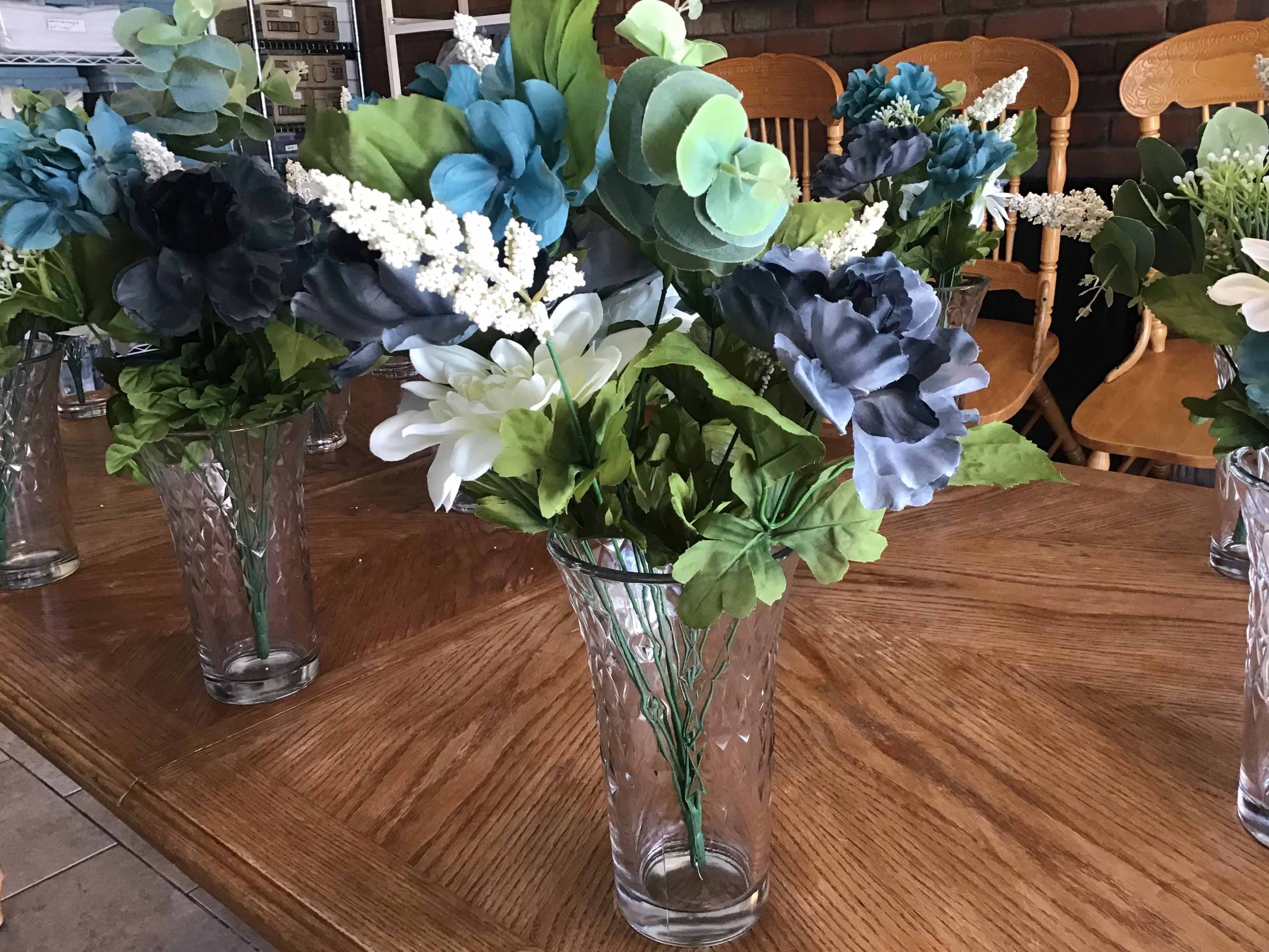 box of plastic/silk flowers