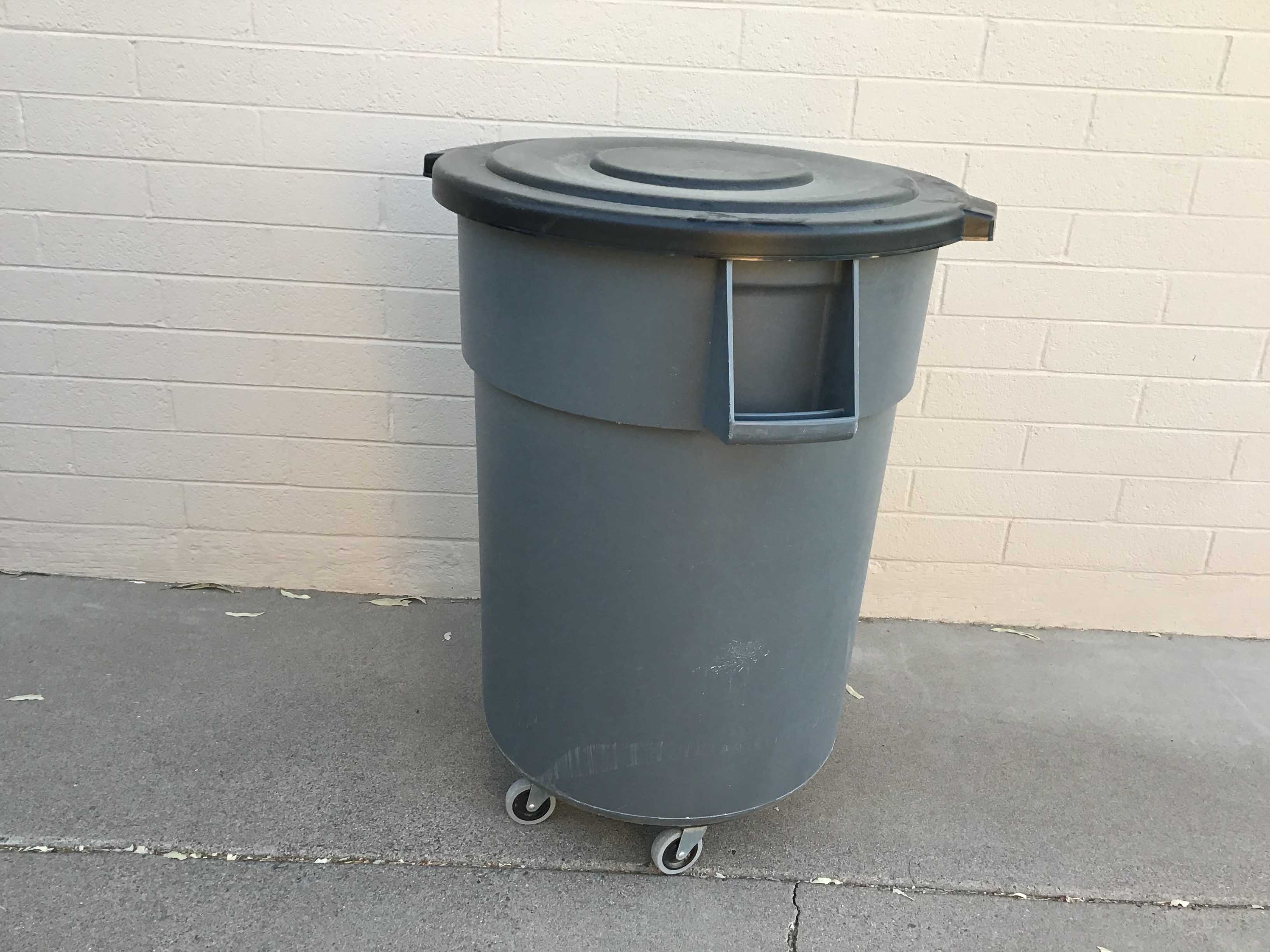 50-gallon trash can on wheels