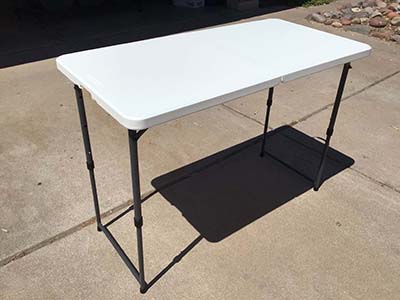 4 foot rectangle tables (adjustable, 4 heights; Mainstay)