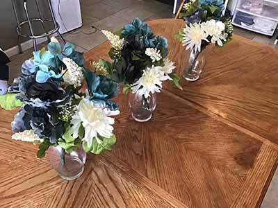 box of plastic/silk flowers