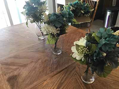 box of plastic/silk flowers