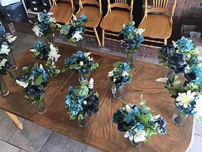 box of plastic/silk flowers
