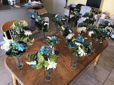box of plastic/silk flowers