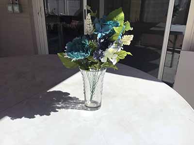 box of plastic/silk flowers