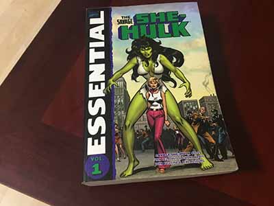 Essential She-Hulk comic book on table