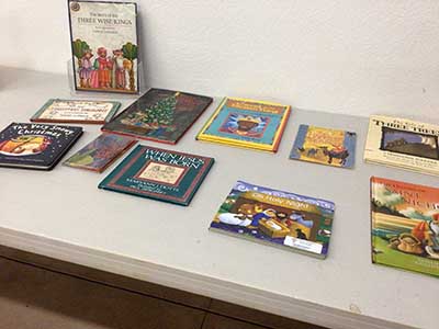 Christmas books displayed on a table