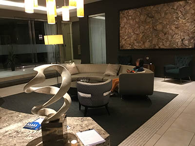 Kumiko sitting in lobby