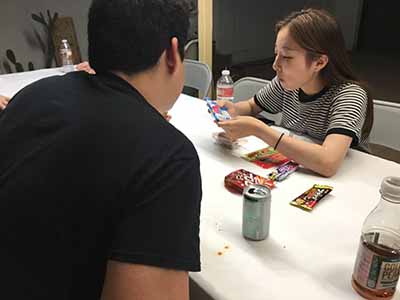 student showing guest Japanese treats