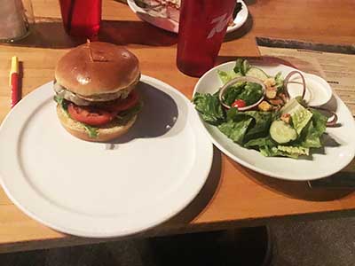 hamburger and salad ordered at Spokes restaurant