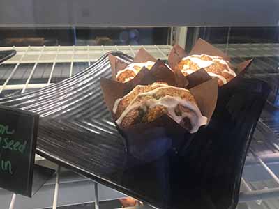 muffins in baked goods display case