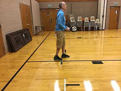 neighbors playing pickleball