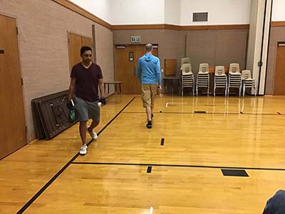 neighbors playing pickleball