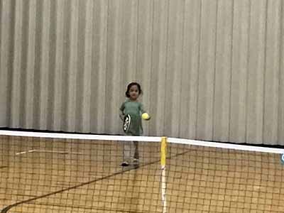 neighbors playing pickleball