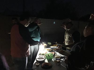 people at potluck dinner