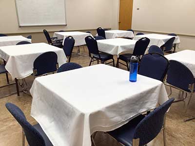 tables with white tablecloths