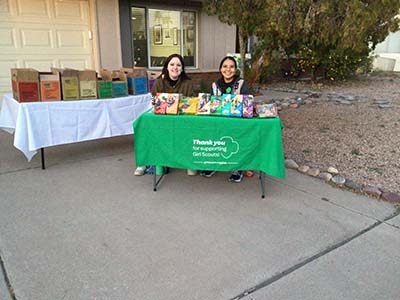 Girl Scouts selling Girl Scout cookies