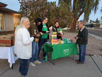 Girl Scouts selling Girl Scout cookies