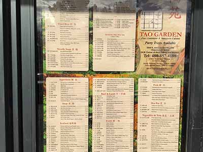 Tao Garden restaurant menu posted in window