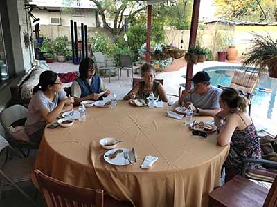 people at potluck dinner