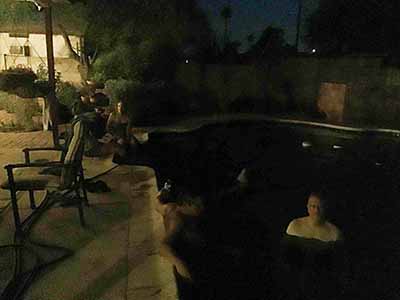 people in pool at potluck dinner