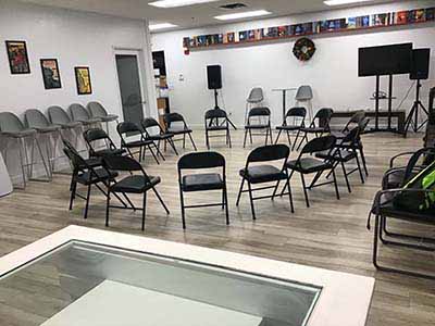 Empty chairs set up in Poisoned Pen Bookstore, preparing for book club meeting