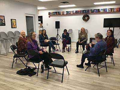 neighbors gathered for book club meeting