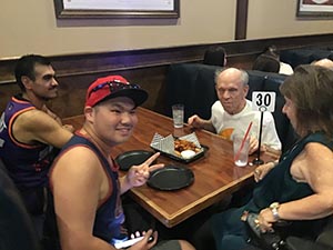 neighbors at welcome dinner for ESL students from Japan