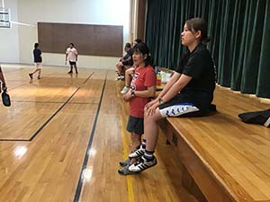 neighbors playing pickleball