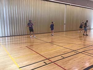 neighbors playing pickleball