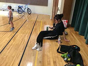 neighbors playing pickleball