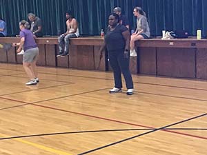 neighbors playing pickleball