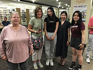 neighbors at art reception at Tempe Public Library