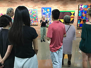 neighbors at art reception at Tempe Public Library