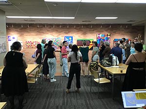 neighbors at art reception at Tempe Public Library