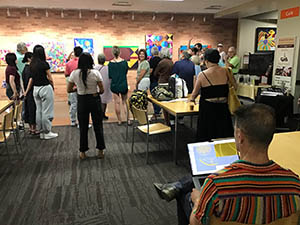 neighbors at art reception at Tempe Public Library