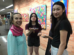 neighbors at art reception at Tempe Public Library