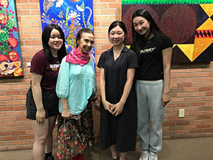 neighbors at art reception at Tempe Public Library