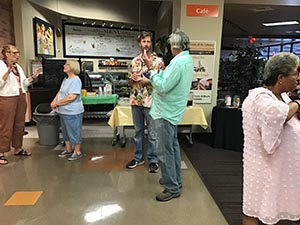 neighbors at art reception at Tempe Public Library