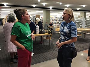 neighbors at art reception at Tempe Public Library