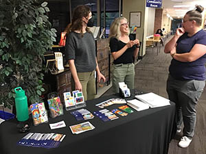 neighbors at art reception at Tempe Public Library