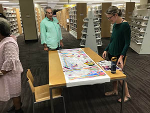 neighbors at art reception at Tempe Public Library