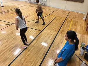 neighbors playing pickleball