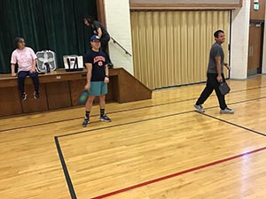 neighbors playing pickleball