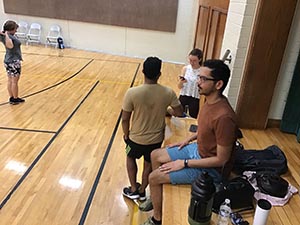 neighbors playing pickleball