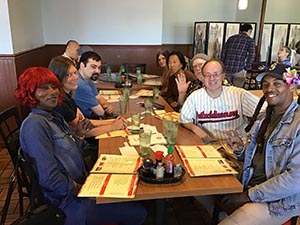 neighbors gathering for Christmas dinner at Chen's Noodle House