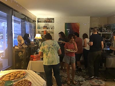 neighbors and food at Meow Mixer potluck lunch