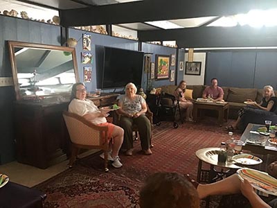 neighbors and food at Meow Mixer potluck lunch