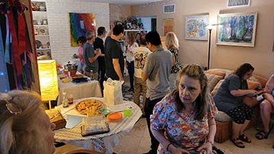 neighbors and food at Meow Mixer potluck lunch