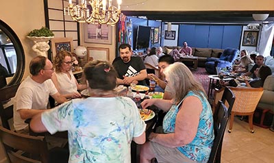 neighbors and food at Meow Mixer potluck lunch