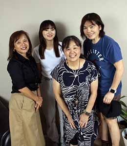 professional portrait photo of Kotone and neighbors at farewell open house for Kotone